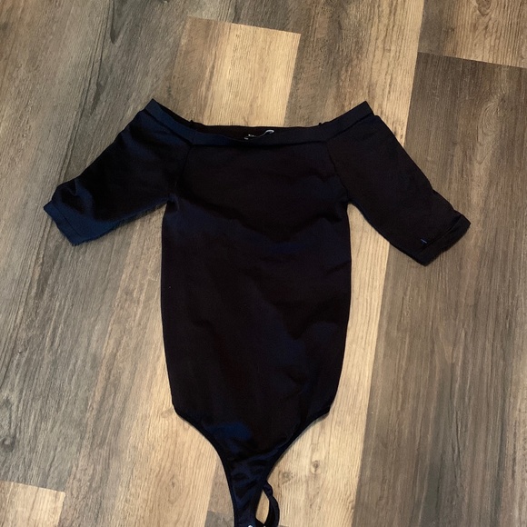 Bebe boatnuch 3/4 sleeve‎ thong bodysuit. Worn twice - Picture 1 of 4